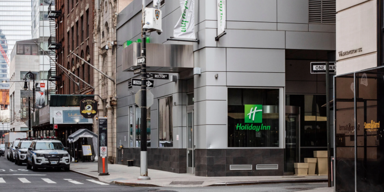 The Holiday Inn FiDi, a large hotel in Lower Manhattan, is now in foreclosure after defaulting on its loans. Some developers are pushing to convert struggling hotels like this one to affordable housing, Katherine Marks for The New York Times