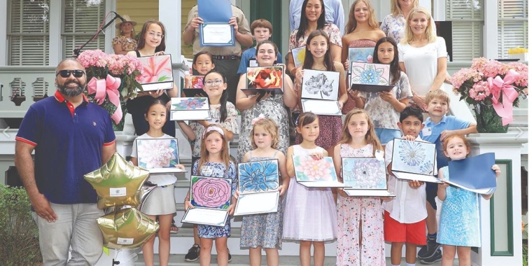Senator Kevin Thomas, The Garden City Historical Society President Bill Garry, The Garden City Schools Director of Art and Music Nina Prasso, County Legislator Laura Schaefer with The Blooms of Garden City Award Winners and Young Directors