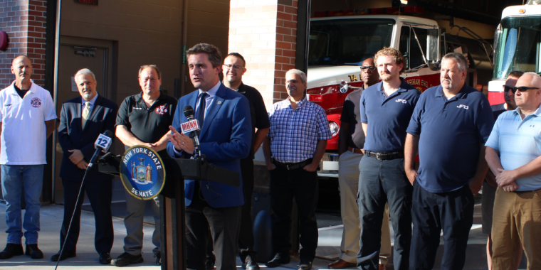 Firefighters from Monroe, Minisink, Pine Island, Warwick, and Woodbury, as well as EMTs from New Windsor and Cornwall, join Senator Skoufis at Harriman Engine Co.