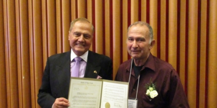 Senator Bonacic presents James Gregston Greer V with a Senate Resolution.