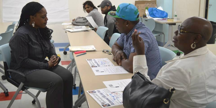 Camee Lee of 100 Suits For 100 Men assisted attendees with their resume writing and interview skills.