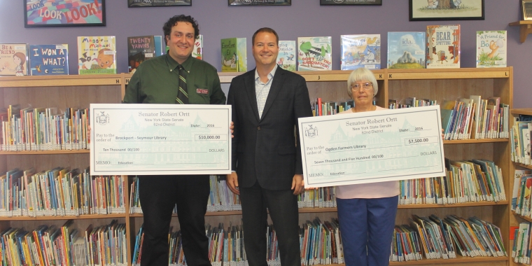 Pictured at Seymour Library from left to right: Seymour Library Director Carl Gouveia, Senator Ortt, and Ogden Farmers Library Board Member Linda Tague.
