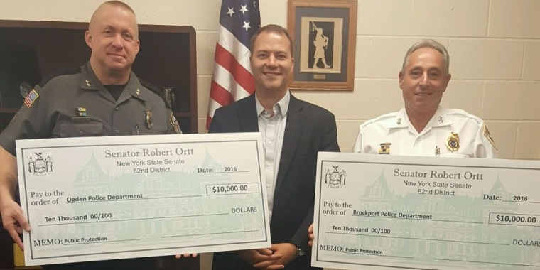Pictured at the Ogden Police Department from left to right: Town of Ogden Police Chief Christopher Mears; Senator Ortt; and Brockport Police Chief Daniel Varrenti.