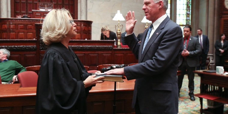 The Honorable Janet DiFiore, Chief Judge of the State of New York, administers the oath of office to Ranzenhofer on the floor of the State Senate.