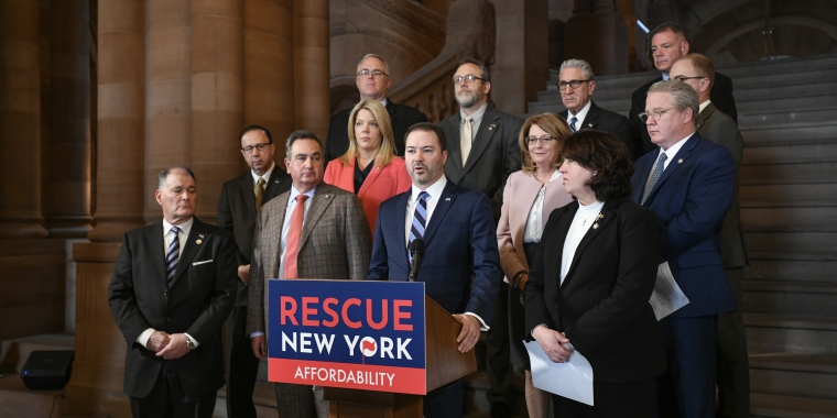 (At Podium: Leader Rob Ortt standing with Members of the NYS Senate Republican Conference. Photo credit: NY Senate)