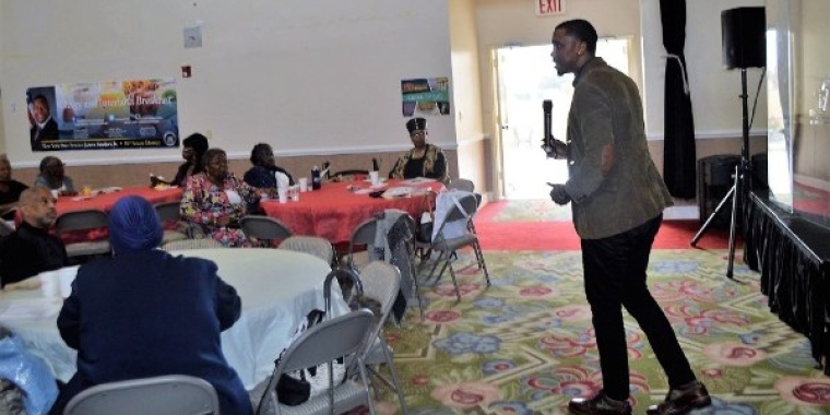 Guest speaker, Jamal Smith, Senior Financial Counselor, with Urban Upbound gave the faith-based leaders important information about money management.
