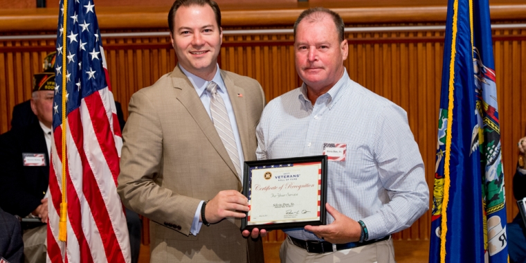 Silviu Dan Jr. accepted the Veterans' Hall of Fame honor on his father's behalf