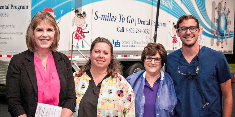 Senator Young with UB Mobile Dental Van Staff: Shirley Hammond, Program Dental Hygienist; Paula Fischer, Project Coordinator for Rural Dentistry Program; Rob Davis, UB Senior Dental Student