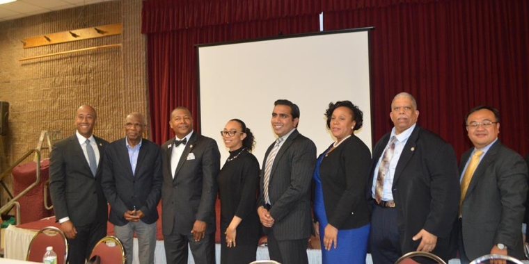 Representatives and leaders at the meeting included (from left) Assembly Member Clyde Vanel, Rev. Henry T. Simmons, State Senator James Sanders Jr., Assembly Member Michelle Titus, Hersh Parekh of the Governor's Office, Assembly Member Alicia Hyndman, Senator Leroy Comrie and Dr. Chris Hsu, Director of the CUNY Aviation Institute.