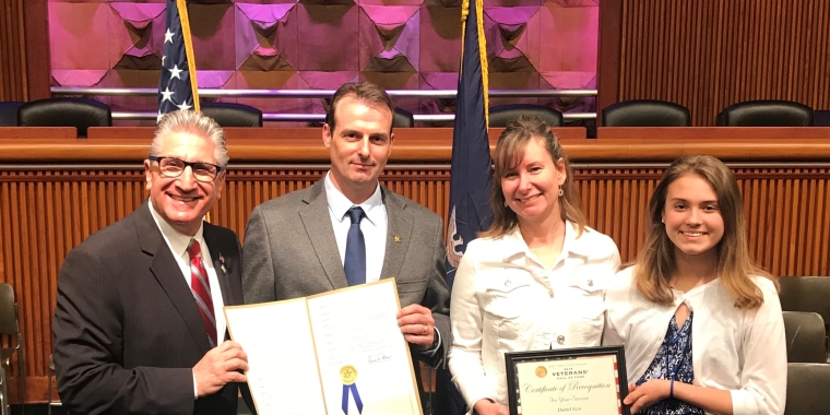 Pictured: Senator Jim Tedisco, Daniel Izzo, Carla Izzo (Daniel's wife), and Viktorija Izzo (their daughter).