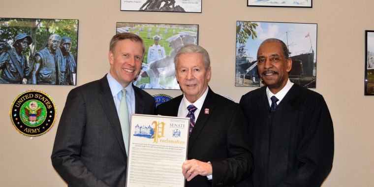 Senator Jacobs is pictured presenting a proclamation to April Veteran of the Month John O'Connor from Kenmore, and Buffalo City Court Judge Robert Russell in the Buffalo Veterans Treatment Court.