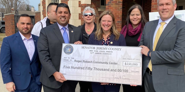 (Left to Right) Rochester City Councilmember Jose Peo, Charlotte Business Association Treasurer Jonathan Hardin, Senator Jeremy Cooney, Charlotte Community Association President Sue Roethel, Assemblymember Sarah Clark, County Legislator Yversha Roman, County Executive Adam Bello