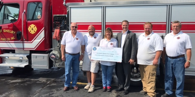 Pictured at East Shelby Volunteer Fire Company from left: East Shelby Vol. Fire Co. Steward Dave Green; 3rd Assistant Chief Dan Culver; 2nd Assistant Chief Debbie Taylor; Senator Rob Ortt; Fire Chief Andy Beach; and Trustee Gordon Reigle.