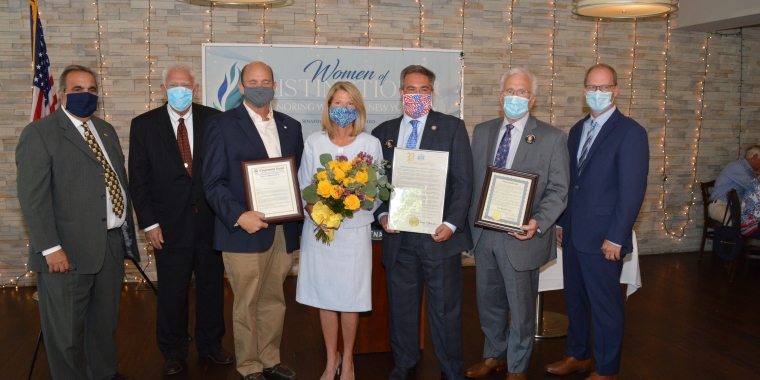 The region’s elected officials joined Senator Borrello to celebrate Jones Memorial Hospital President/CEO Eva Benedict as a New York State Senate “Woman of Distinction.” From left to right: Assemblyman Joe Giglio; President/CEO of Strong Memorial and Highland Hospitals, Steven Goldstein; Congressman Tom Reed; Eva Benedict; Senator Borrello; Wellsville Mayor Randy Shayler; Jones Memorial Board Chairman Richard Ewell.