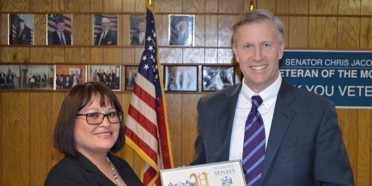 Senator Jacobs is pictured presenting a proclamation to February Veteran of the Month Matejka Baumgardner