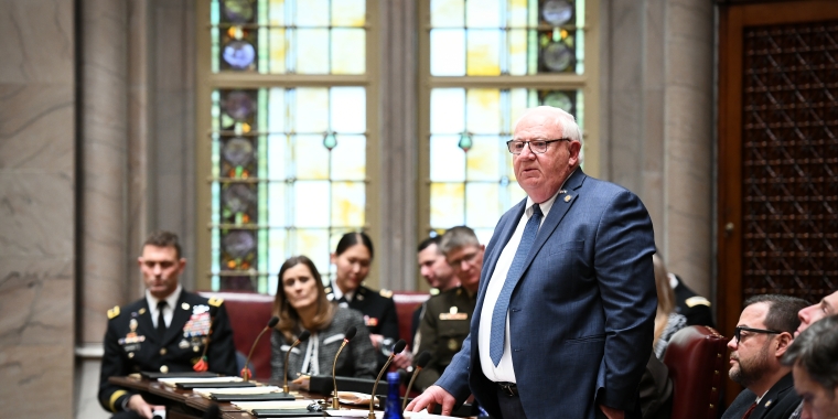 Senator Brooks introduces a Resolution on the floor of the Senate proclaiming February 26, 2020 to be Fort Drum Day while Major General Brian J. Mennes and his General Staff from Fort Drum look on.