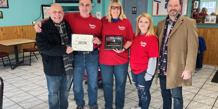 Sen. Rob Ortt and Assemblyman Angelo J. Morinello recognize Frenchy’s Pizzeria with the SD62 Small Business of the Month Award. (L-R: Assemblyman Morinello, owners Vic and Judy Muto, manager Mikayla Magliazzo, and Sen. Rob Ortt)