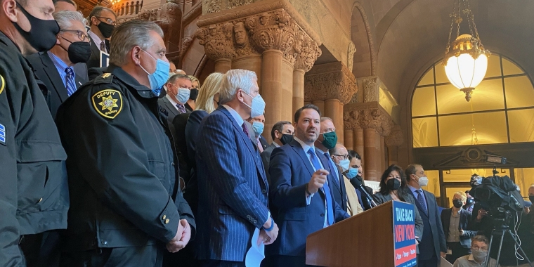 (At Podium: Senate Republican Leader Rob Ortt; To left: Nassau County Executive Bruce Blakeman; To right: Assembly Republican Leader Will Barclay)