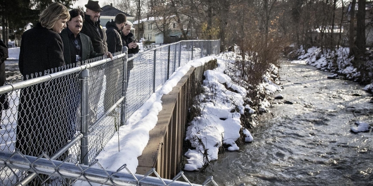 Commissioner Parrino and Senator Young join Gowanda officials to survey Thatcher Brook, a frequent source of flooding in the community.