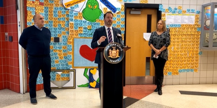 (At Podium: Senate Republican Leader Rob Ortt; To left: Niagara Falls City School District Superintendent Mark Laurrie; To right: Lisa Dugan, a concerned Niagara Falls Grandmother)