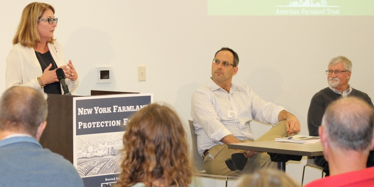 Senator Pam Helming delivers opening remarks during her New York Farmland Protection Forum that she hosted on Thursday, Nov. 16, as Agriculture Protection Specialist Jeff Kehoe, left, and Grant Manager John Brennan from the New York State Department of Agriculture and Markets look on.
