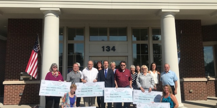 Sen. Rob Ortt presents $40,000 to two Orleans County museums and four Orleans County libraries for educational resource improvements.