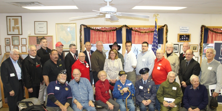 Senator Pam Helming stands with the veterans from Wayne County who were recognized for their nomination to the New York State Senate Veterans Hall of Fame during a ceremony at Williamson American Legion Post 394.