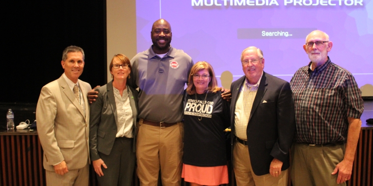 From left to right: Seneca Falls Central School District Superintendent Robert McKeveny, Generations Bank representative Katie McIntyre, Officer Jermaine Galloway, Senator Pam Helming, Generations Bank represenative Robert Kernan, and Seneca Falls Board of Education President Joseph McNamara, following the Tall Cop Says Stop presentation in Seneca Falls in September 2017.