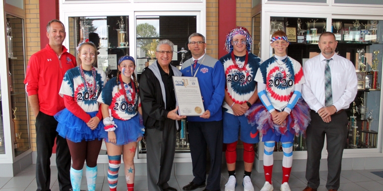 Pictured L-R: Mark Brooks, BPHS principal, Sydney Rogers, senior captain of volleyball team, Rose Barnhart, senior captain of girls soccer team, Senator Tedisco, Stephen Tomlinson, superintendent, Dante Calderone, senior captain of football team, Kyle Denman, senior captain of boys soccer team and Adam Barnhart, assistant high school principal and director of athletics.