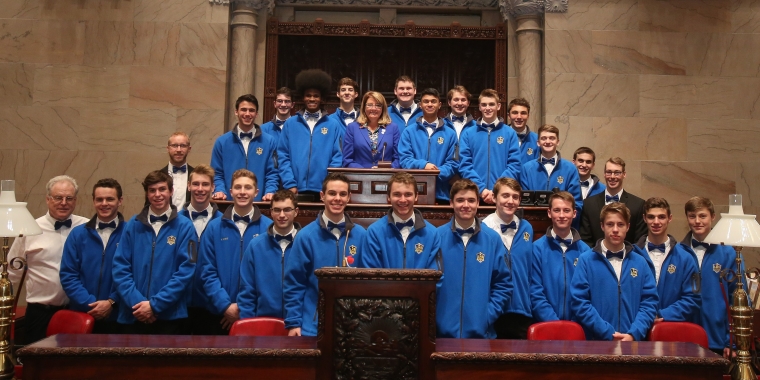 Senator Pam Helming stands with members of the Lansing High School Bobcats boys soccer team that won the 2017 New York State Public High School Athletic Association Championship, Head Coach Benji Parkes, and assistant coaches during a ceremony in the New York State Senate chamber on Tuesday, April 17.
