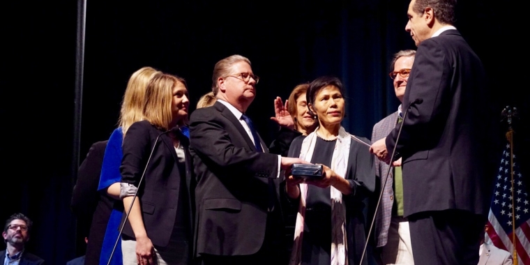 Peter B. Harckham, surrounded by family takes the oath of office as NYS Senator., administered by Governor Andrew Cuomo.