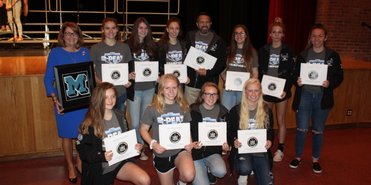 Senator Pam Helming with Assistant Coach Todd Jones and members of the Midlakes Screaming Eagles girls varsity basketball team that won the Section V, Class B championship during the winter season.