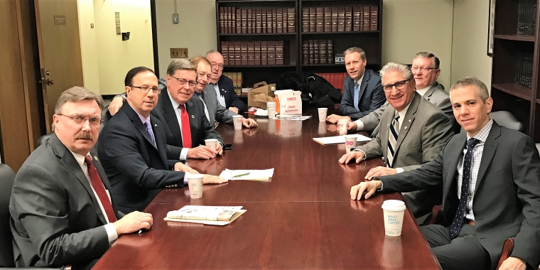 The Mohawk Valley Nine hold their initial caucus meeting at the Capitol in Albany. Left side of table from front, Assemblyman Miller, Senator Griffo, Senator Seward, Assemblyman Butler, Assemblyman Magee. Right side of table from front, Assemblyman Brindisi, Senator Tedisco, Assemblyman Blankenbush, Senator Valesky.