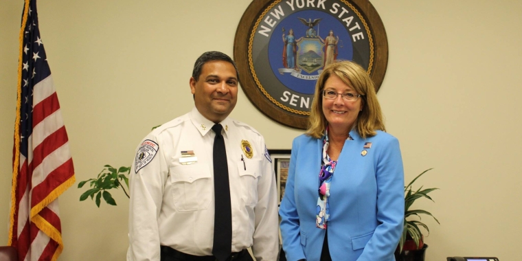 Senator Pam Helming meets with NEQALS President Syed Ahmed Mustafa in her District Office in Geneva in September 2017.