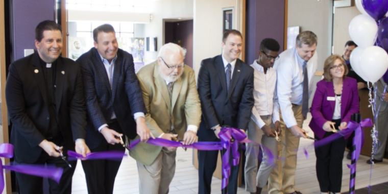 Cutting the ribbon on the new Dining Commons at Niagara University are, from left, the Rev. James J. Maher, C.M., NU president; Jeff Metz, president and CEO of Metz Culinary Management; William Hovey, partner at BHNT Architects; New York Senator Robert Ortt; Khallid Lewis, president of the Niagara University Student Government Association; Peter Appler, regional sales manager for Danforth; and Dr. Debra Colley, NU's executive vice president.