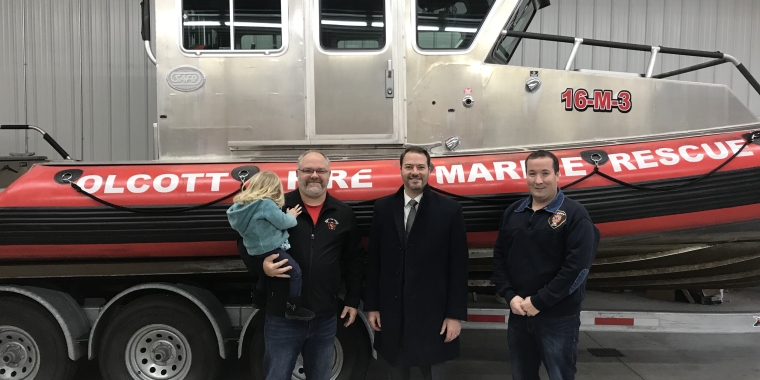 Sen. Rob Ortt joins Olcott Fire to view the company’s 31-foot water rescue vehicle. Photo (L-R: Olcott Fire Company President, Rob Boyer, Sen. Rob Ortt, Olcott Fire Company Chief, Steve Miller)