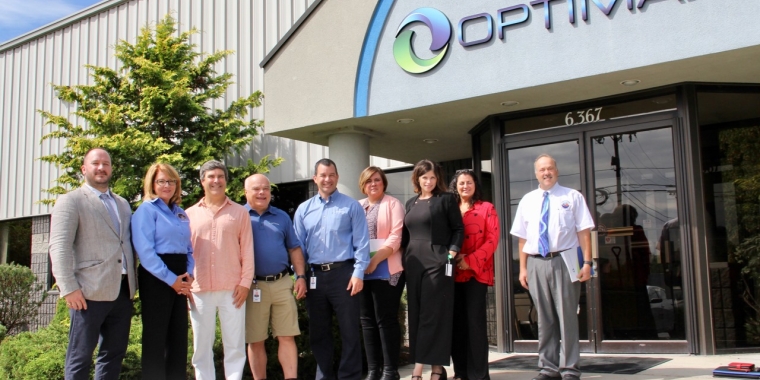 Senator Helming at Optimax in 2019, when she presented the company with a New York State Senate Empire Award