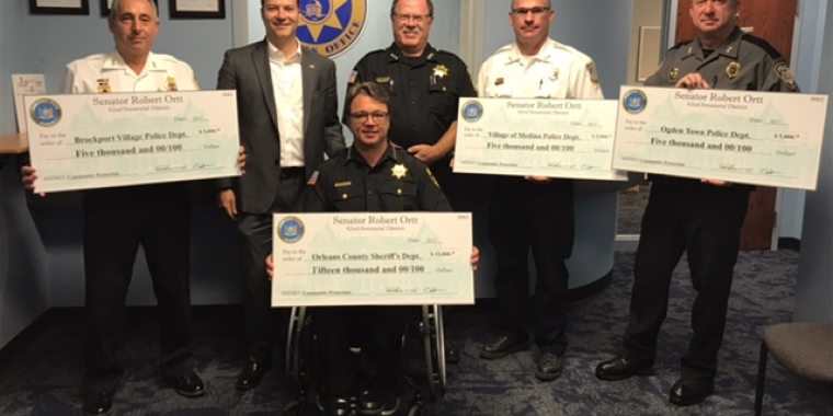 Pictured at the Orleans County Sheriff’s Office (front row): Orleans County Sheriff Randy Bower; (back row from left): Brockport Police Chief Daniel Varrenti; Senator Rob Ortt; Orleans County Undersheriff Christopher Bourke; Medina Police Chief Chad Kenward; and Ogden Police Chief Christopher Mears.