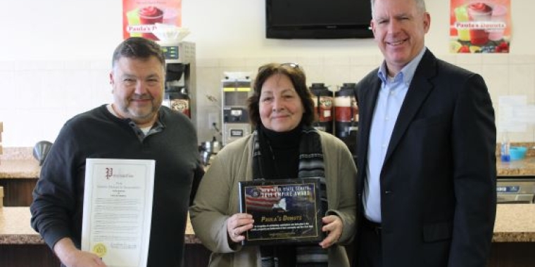 Senator presents Chuck and Paula with Empire Award