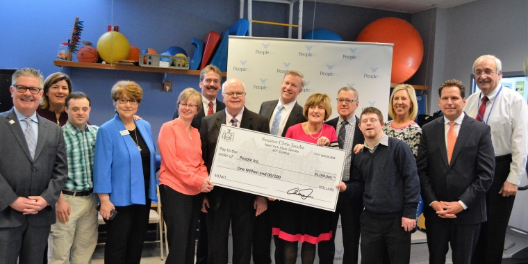 Senator Jacobs is pictured with People Inc. clients, board members and staff announcing $1 million in funding he secured to expand healthcare delivery at People Inc.'s Elmwood Health Center