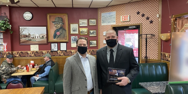 Sen. Rob Ortt (Left) recognizes Brody Hoffmeister (Right), Owner of Rudy’s Café, with the SD62 Small Business of the Month Award
