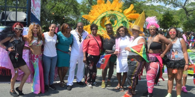 Senator Sanders was joined by masqueraders, community leaders and elected officials including City Councilwoman Farah Louis, fourth from right, City Councilwoman Alicia Hyndman, third from right, and recent Queens DA candidate Tiffany Caban, third from left.