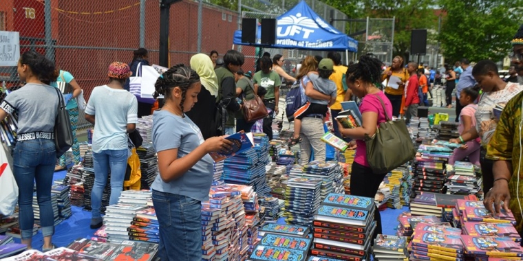 Community members and their families looked through the variety of books being offered.