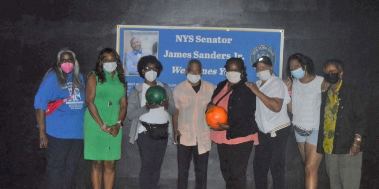 Seniors from all over the district filled the lanes at Bowl 360 and enjoyed the bowling fun. They were joined in this photo by Senator Sanders' District Manager, Lisa George, second from left.
