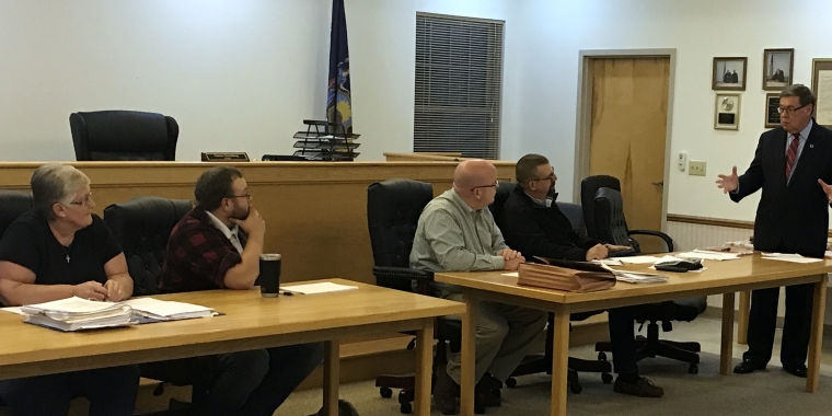 Senator James L. Seward addresses the Hartwick Town Board while announcing a $1 million state grant to fund major upgrades to the town’s water system. From left, Janice Gage, Quinton Hasak, Supervisor Robert O'Brien, Chris Briggs, Senator Seward.