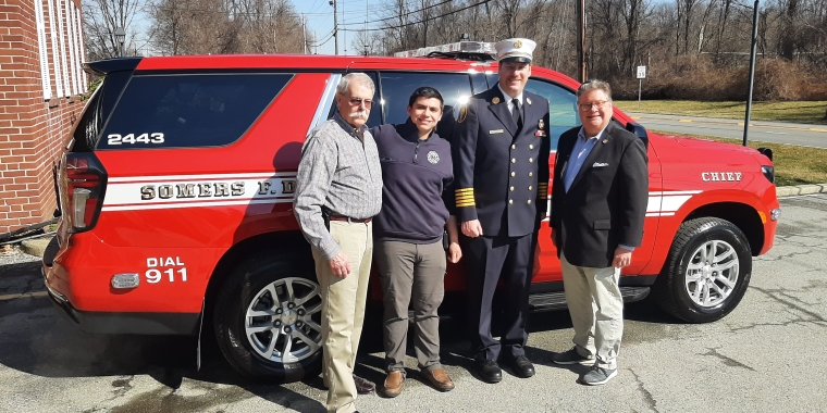 Sen. Harckham with (l-r) Commissioner FitzGerald, firefighter Rocco Latella and Chief Mackey