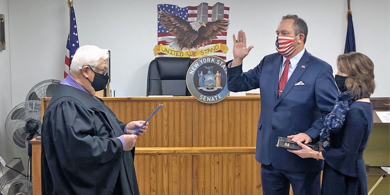 Senator Peter Oberacker joined by his wife Shannon takes the oath of office at the Town of Maryland Courthouse. From left, Town of Maryland Justice Honorable Joseph Staruck, Senator Peter Oberacker, Shannon Oberacker.