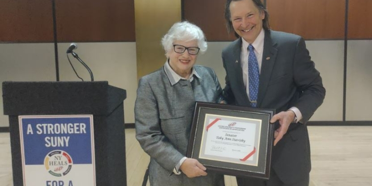 UUP President Dr. Frank Kowal presents Senator Toby Ann Stavisky, Chair of the Senate Higher Education Committee, with a Certificate of Appreciation.