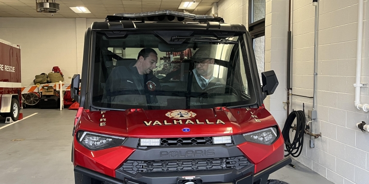 Sen. Harckham and former VFD chief Mickey Kohany inside Mini Attack 1 getting ready for a test drive