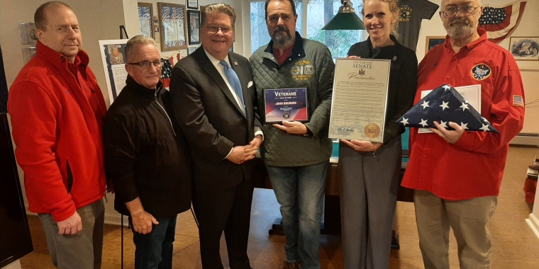 State Sen. Pete Harckham in suit and tie with (l-r) Art Hanley, deputy director of the Putnam Veterans Service Agency; Jack Duncan, director of the Dwyer Vet 2 Vet Program of Putnam County; John Bourges; Megan Castellano, executive director of the Mental Health Association in Putnam County; and Karl Rohde, director of the Putnam County Veterans Service Agency.